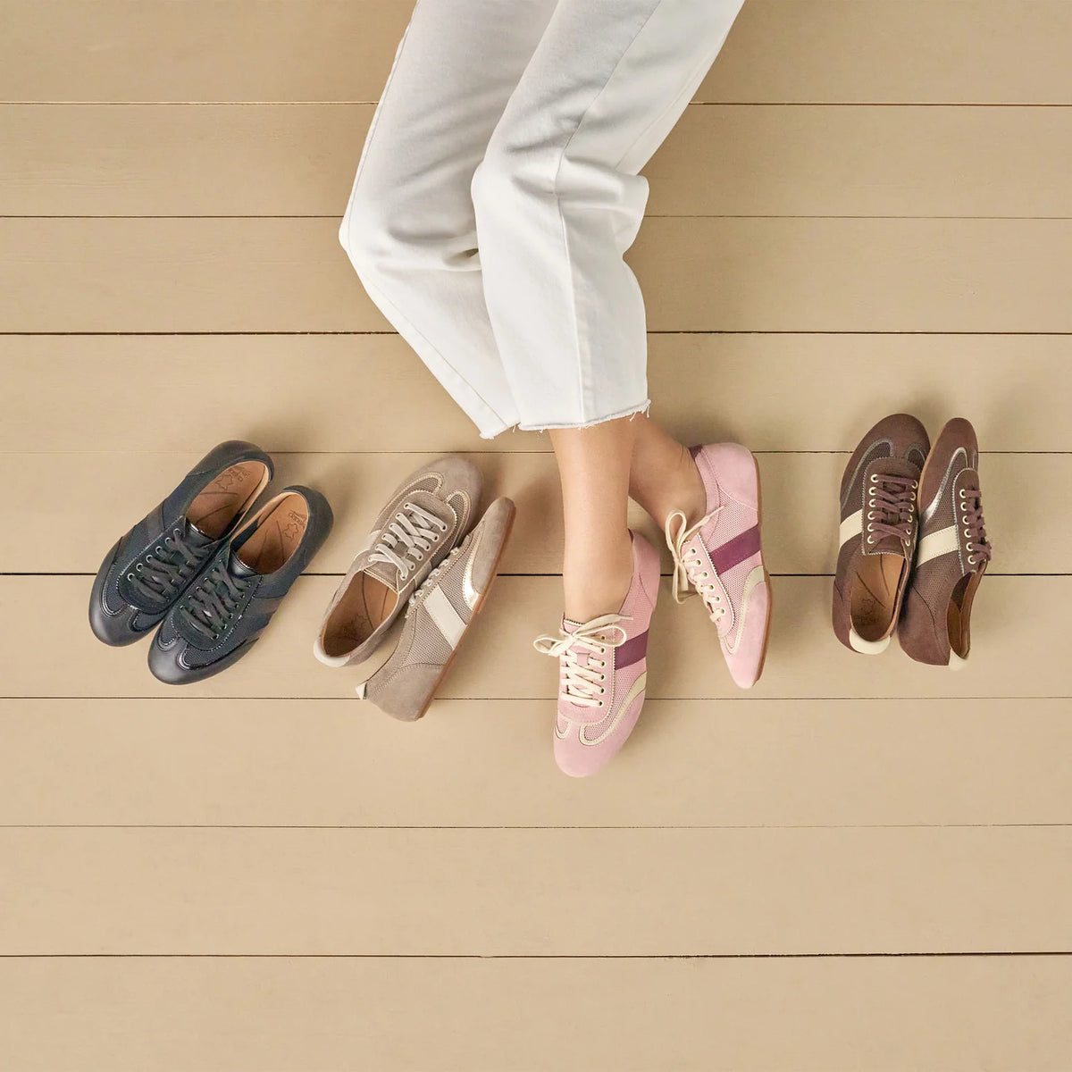 Model wearing Dansko sneakers flatlay